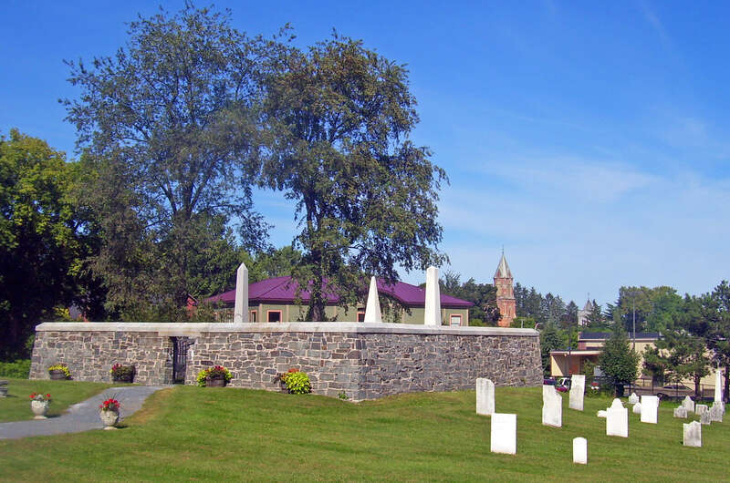 Gideon Putnam Burying Ground, Saratoga Springs, NY, USA. Obelisks mark graves of Putnam, founder of Saratoga Springs, and his immediate family within fenced-off family plot.