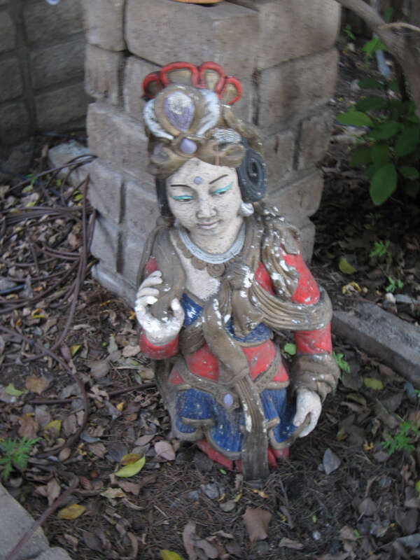 This top half of a Guanyin statue stands in the front yard of Peace Lodge, the private residence of my writing mentor/dear friend Gayle Brandeis.
(To protect privacy, I geotagged this photo in downtown Riverside, rather than the actual