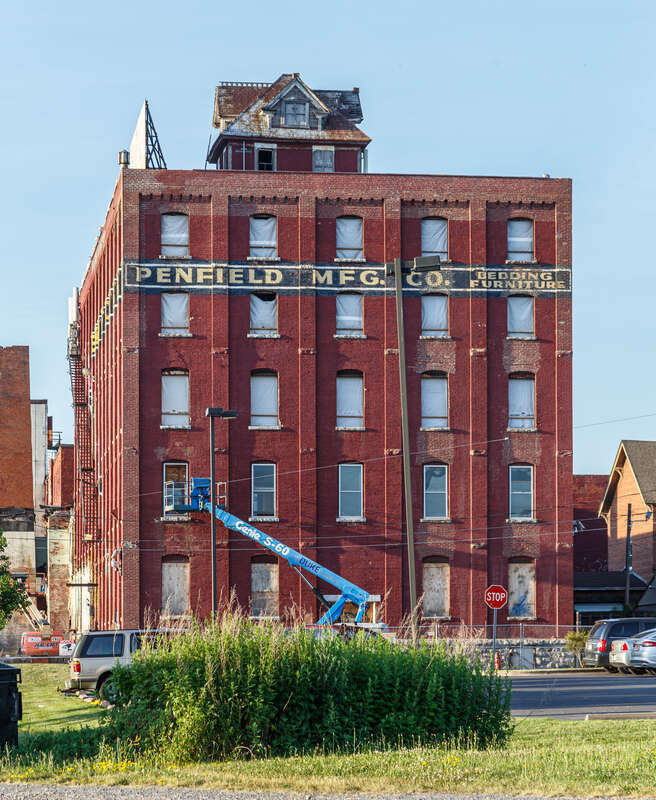 H.A. Moyer Factory building, 1710 North Salina Street, with house on the roof