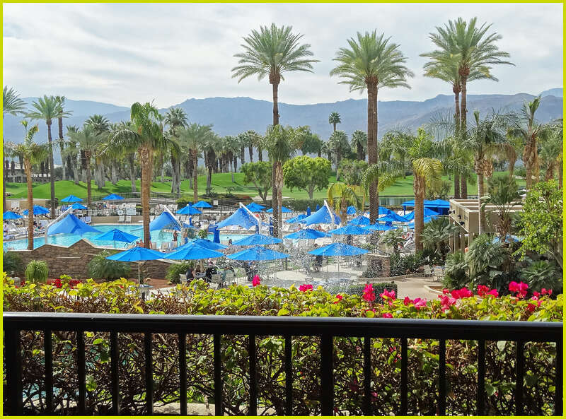 (1 in a multiple picture set)
Looking down on the vast swim and sun area with several different pools.  &quot;Waiter!  A drink please!&quot;