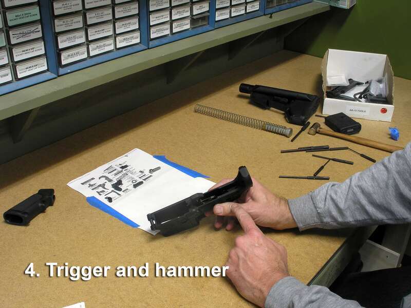 The fire control group (FCG) is in place, except the selector.
The front pivot pin is also installed.  This is potentially the most difficult part of the build, but I have a specialized tool that makes it pretty easy to slide the pivot pin over the
