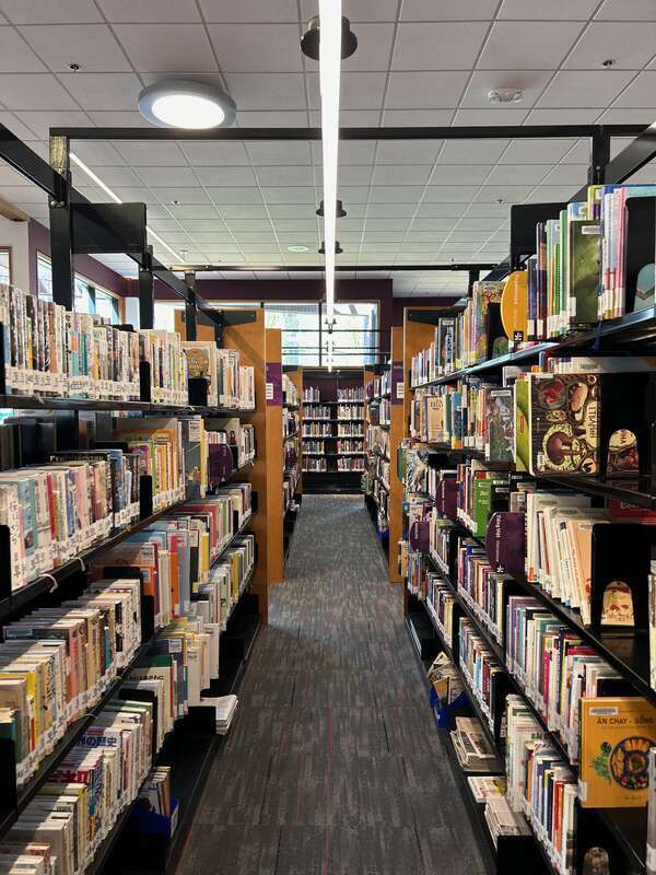 Shelves of international books at the Kent Library in the city of Kent, Washington.