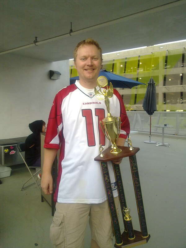 Jonas Neubauer holding his first Classic Tetris World Championship award.