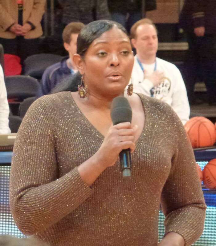 Kym Hampton, singing the national anthem in Madison Square Garden at the 2012  Maggie Dixon classic, 9 December 2012