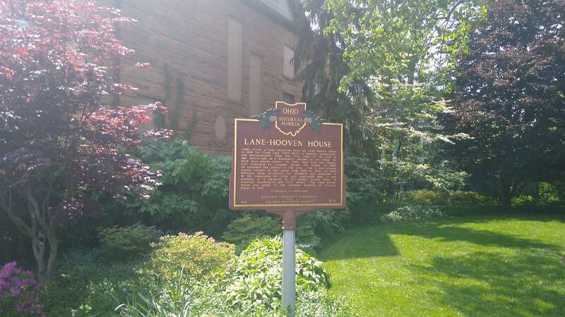 Ohio Historical Marker 7-9, describing the history of the Lane-Hooven House. The street-facing side is pictured here.