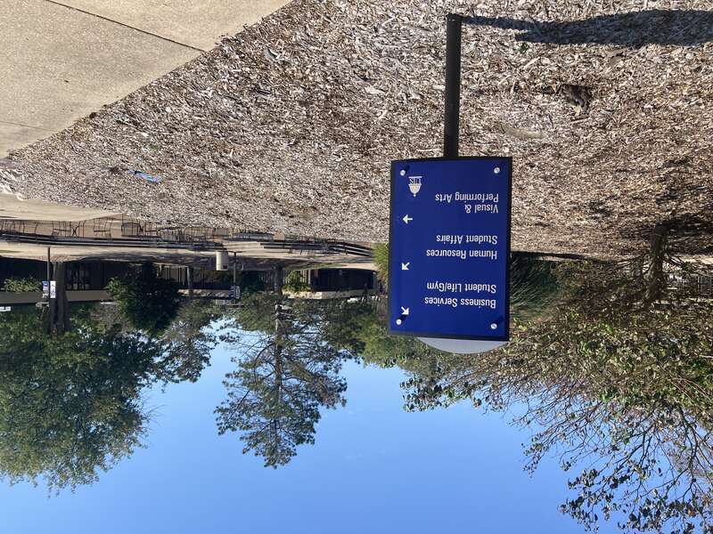 Features sunken courtyard and UIS directory sign