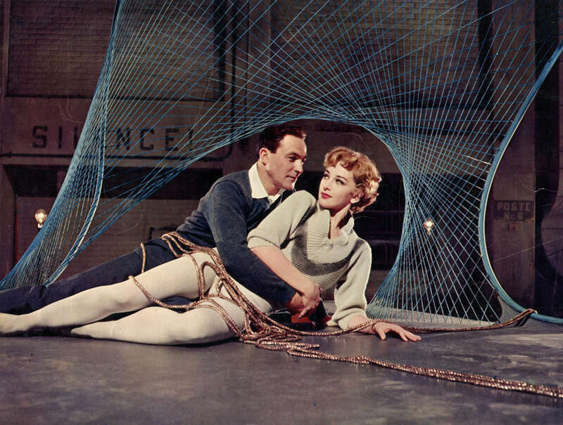 Rhymes with Play Girls (as the ads said). Gene Kelly and Taina Elg. More a witty and involved screenplay with songs than a full-blown musical. Most (but not all) of the numbers are performed in theatrical settings. 
Kelly's last MGM musical, Cole
