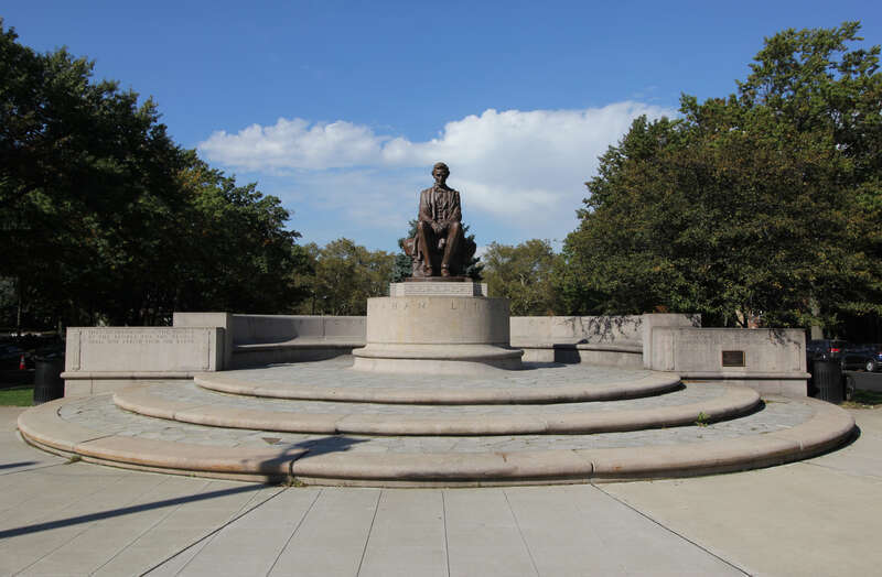 Wide shot of Lincoln the Mystic statue in Jersey City, NJ