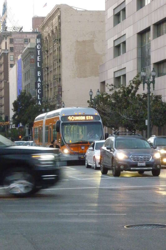Los Angeles - Local bus in Saturday downtown traffic.