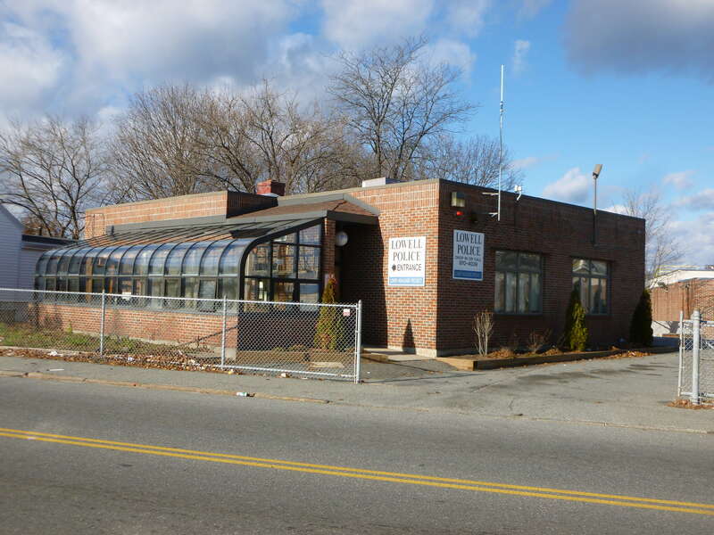 Lower Highlands precinct station of the Lowell Police Department.  South and east sides of building shown.