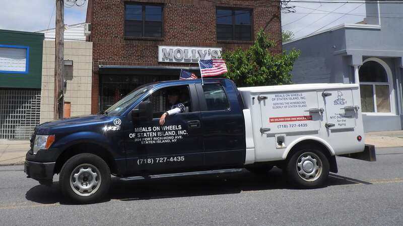 Looking north at food truck on a mostly sunny midday