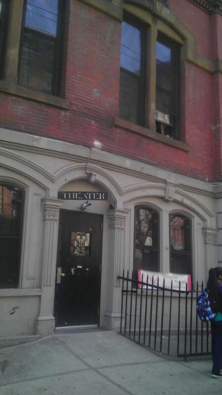 Looking west at Metro playhouse, 220 East Fourth Street, on a sunny afternoon.