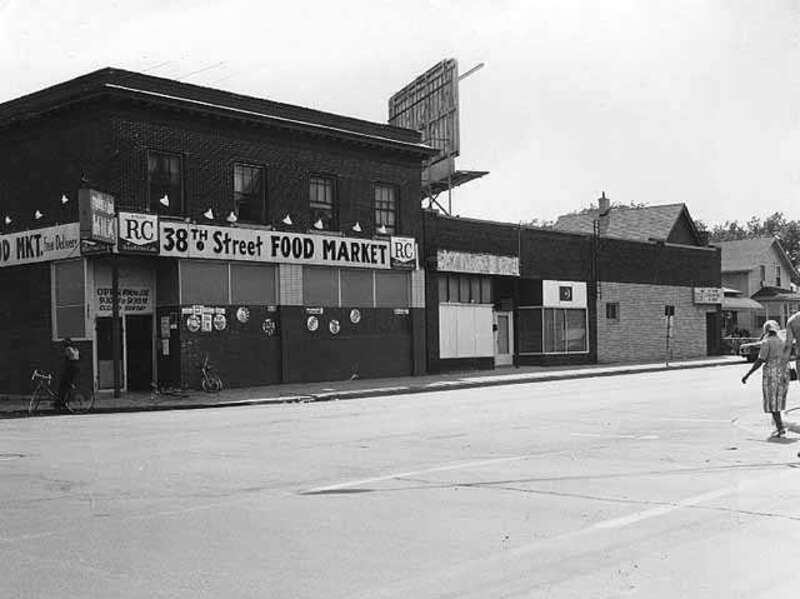 38th St Food Market, 3800 4th Avenue South, Minneapolis, Minnesota, United States. 1975. The two-story building on the corner containing the market no longer stands.
