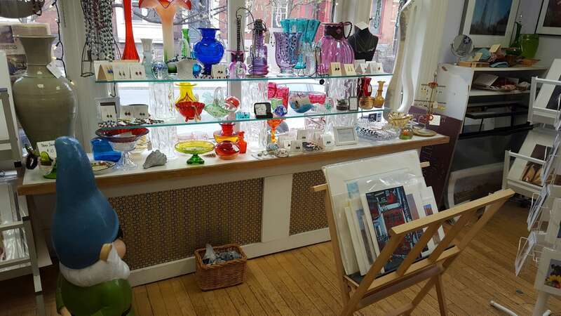 National Upholstery also has art and decorative glass. The Capital District Tourism Gnome bought a few pieces.