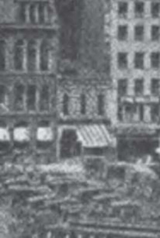Closeup of the Neal Clothing Building on Public Square in downtown Lima, Ohio, United States, apparently seen from the square's southeastern corner.  Date is unknown, but cannot be after 1921.