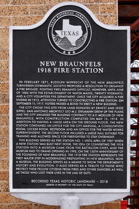New Braunfels 1918 Fire Station historical marker in front of the New Braunfels Fire Museum in New Braunfels, Texas, United States.