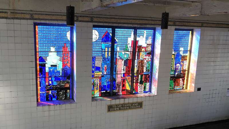 Looking north at window on the station stairway on a sunny afternoon