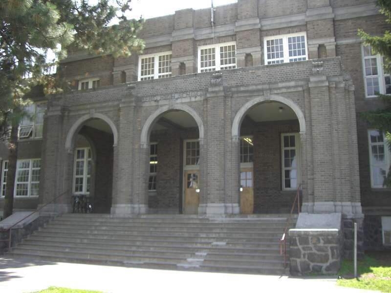 Main entrance to the Old Bend High School in Bend, Oregon, United States. The building is listed on the US National Register of Historic Places, and is now used by the Bend-LaPine School District for administrative offices.NRHP reference number