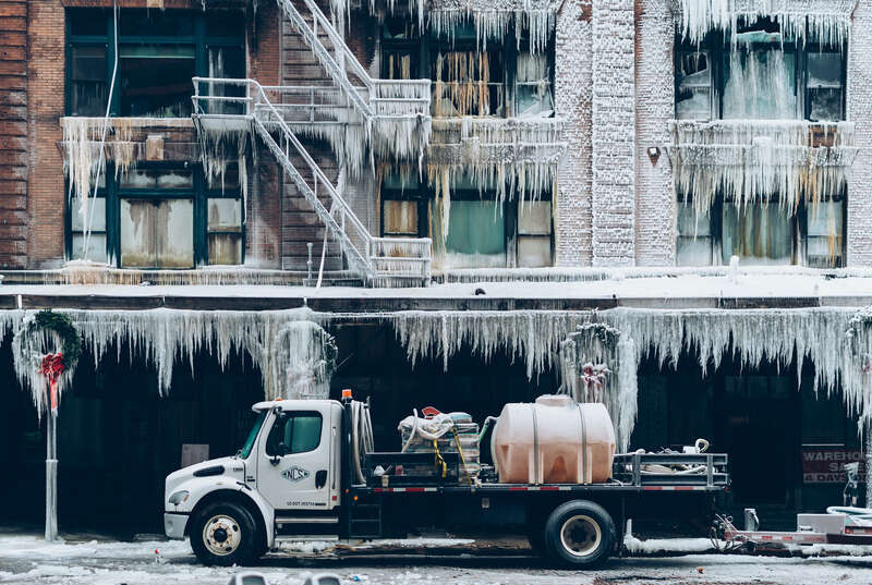 500px provided description: After an explosion, a fire, and hours of trying to put out that fire in frigid temperatures, here's what was left. [#fire ,#city ,#winter ,#cold ,#urban ,#architecture ,#building ,#market ,#ice ,#icicle ,#pub ,#nebraska