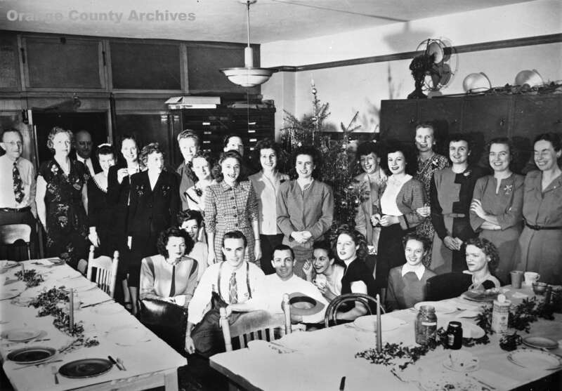 Appearing in the photo are County Recorder Ruby McFarland and (on far left) attorney, Robert Mize. Photo taken in the old Hall of Records building (now demolished).
There are no known copyright restrictions on this image. All future uses of this