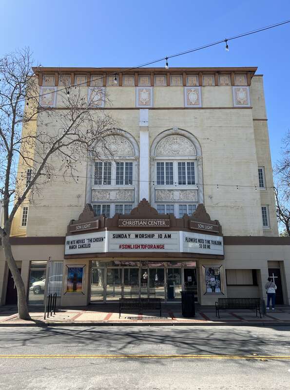 A front view of the historic Orange Theatre in the  district in California.