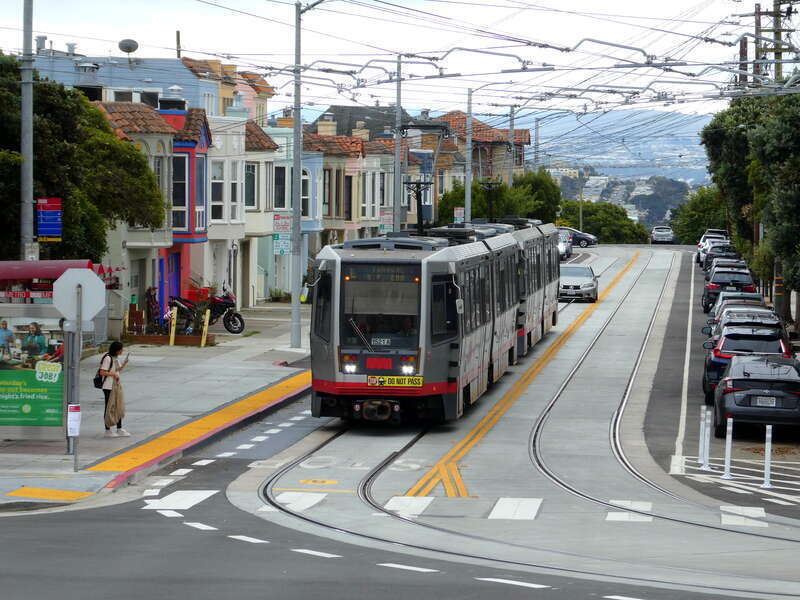 An outbound train arriving at 15th Avenue and Taraval in October 2024