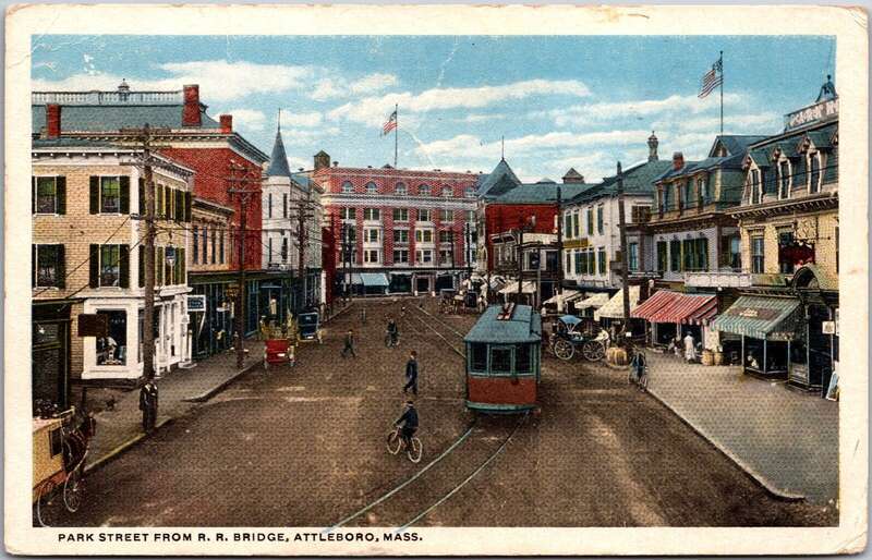 White border postcard of Park Street in Attleboro, Massachusetts, viewed from the railroad bridge. The card was postmarked in 1922.
