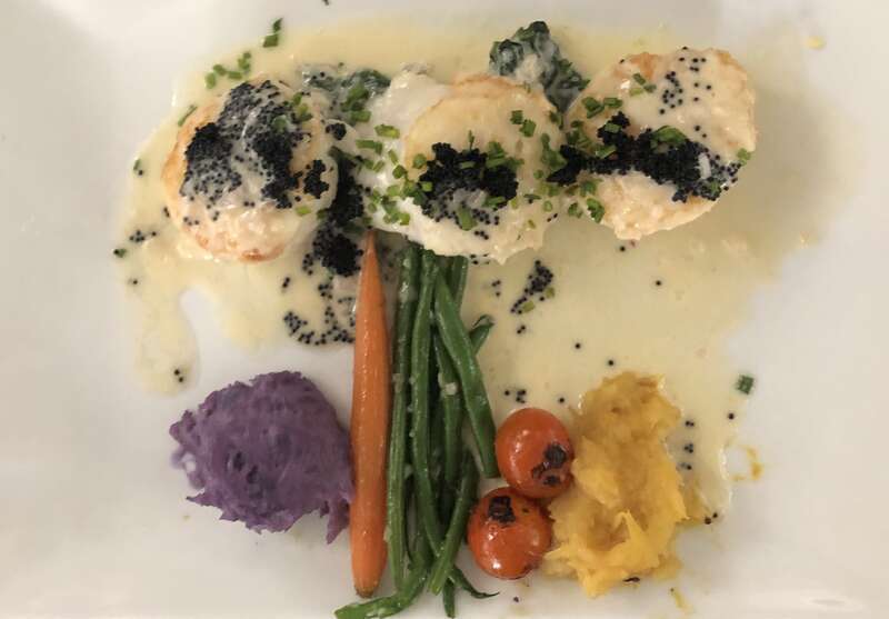 Scallops with caviar vodka sauce and spaghetti squash, tomatoes, green beans, carrots and purple potato at Paso Terra in Paso Robles, California