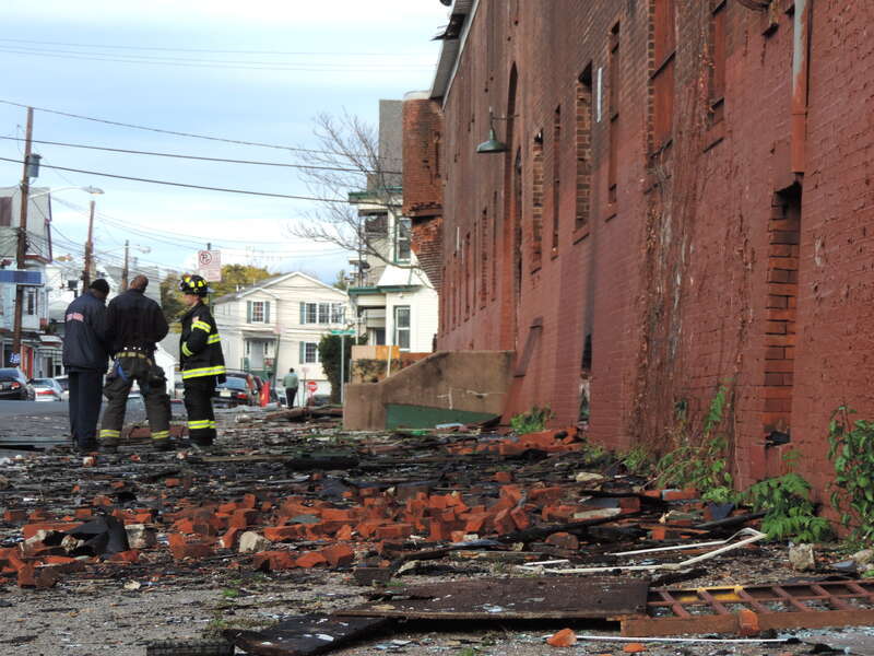 Looking north from Market Street at wall and rubble