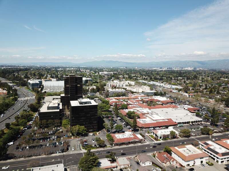 The three towers of the Pruneyard complex in Campbell, California, with CA-17 visible to the left and the Pruneyard shopping center to the right. The view is looking generally north.
