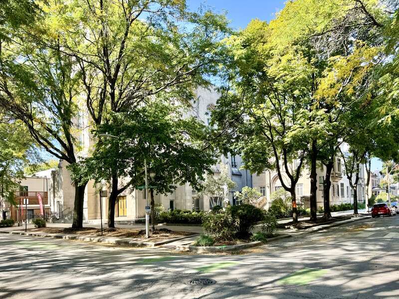 Built in 1938-1940, this Gothic Revival-style building was designed by McCarthy, Smith and Eppig for the Queen of Angels Catholic Church, founded in 1910 to serve the rapidly growing Lincoln Square neighborhood, which had recently seen the completion