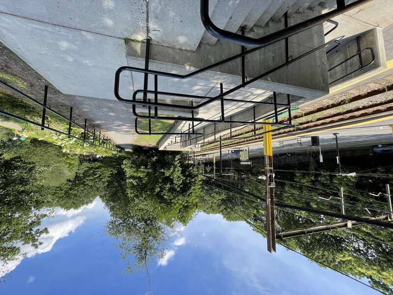 Ramp to the Riverway at Longwood station in June 2021