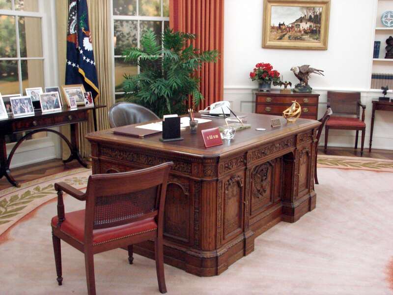 (1 in a 8-picture set)
A full-size reproduction of the White House Oval Office is available to peruse.  His beloved Jelly Belly jelly beans are not on the desk. Maybe he hid them in the drawer.