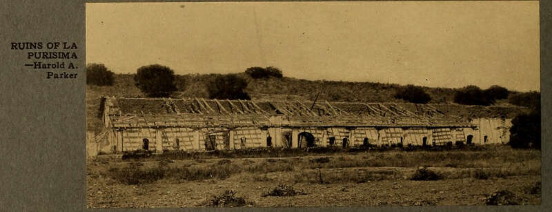 Horizontal image of the decaying mission building set into a hill in Santa Barbara county hills near Lompoc.