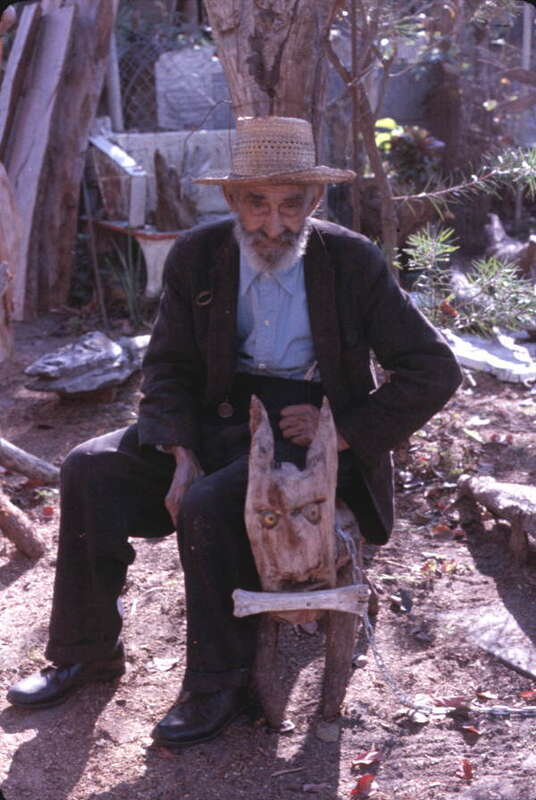 Local call number:  fs7759a
Title: [Sculptor Jesse J. Aaron with one of his wood sculptures : Gainesville, Florida]
Personal Author: Bulger, Peggy A., Collector.
Date: Photographed in December 1976.
Physical descrip: 1 slide : col.
Series Title: