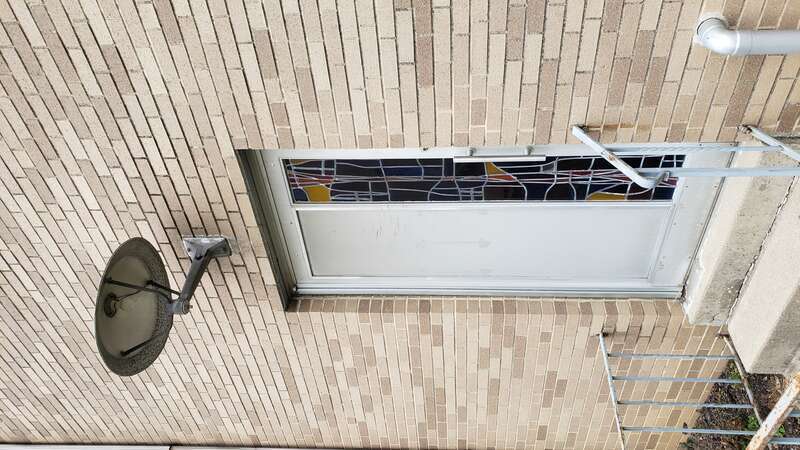 Side door and light at St Teresa