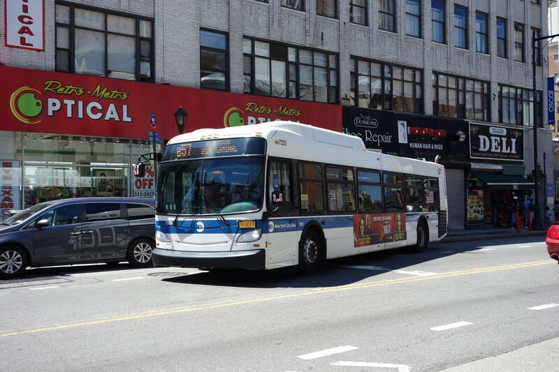 A Red Hook–Ikea Terminal-bound B57 bus leaving a bus stop at Jay Street and Fulton Mall in Downtown Brooklyn.
