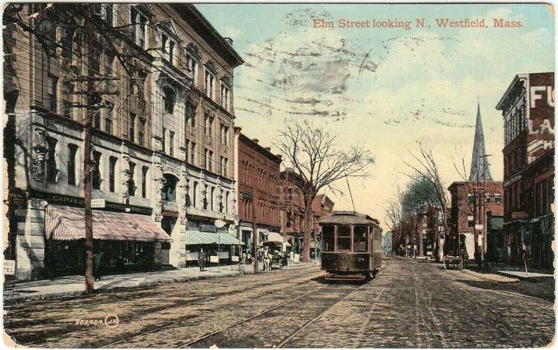 Divided back postcard of a Holyoke-bound streetcar on Elm Street in downtown Westfield, Massachusetts