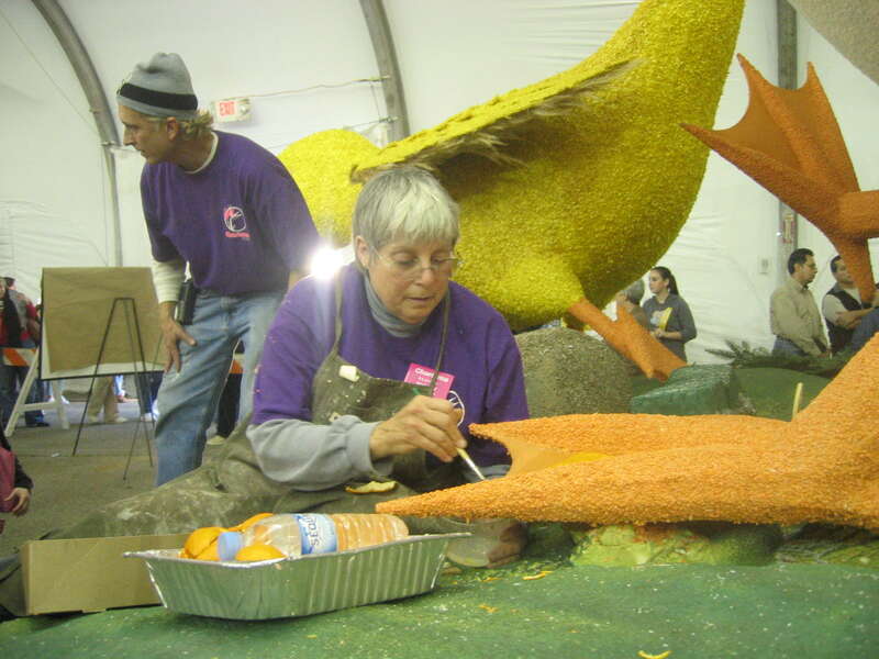 Tournament of Roses float volunteers work to paste flora to the parade float forms, for the 2007 parade.Volunteers