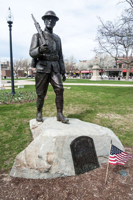 World War I &quot;Doughboy&quot; Statue Memorial on the south side of the Taunton Green. Massachusetts. &quot;Erected in memory of all deceased comrades by the David F. Adams Post No. 611 Veterans of foreign Wars of the U.S.A. and their friends July 5, 1937&quot;