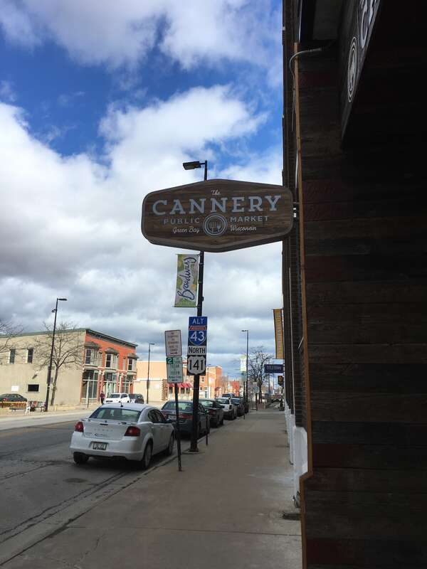 A St. Patrick's Day official ribbon cutting for The Cannery Public Market on Broadway St. in Green Bay, WI. The facility had been open for several months by this time, but the entire week marked a series of special events for the market and