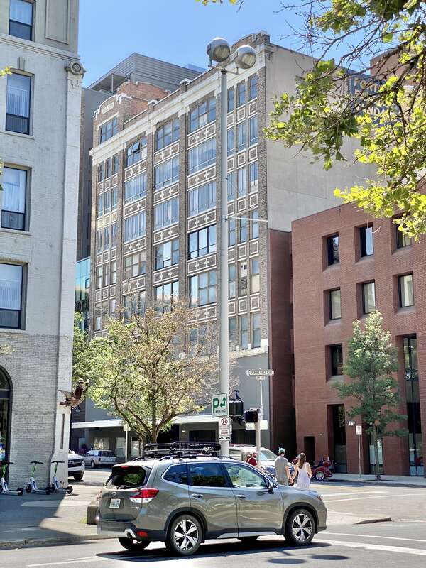 Built in 1921, this Commercial-style building was built to serve as part of the Culbertson Department Store, later housing part of the Wraight Department Store and Macy’s Department Store.  The building features a buff brick exterior with terra cotta