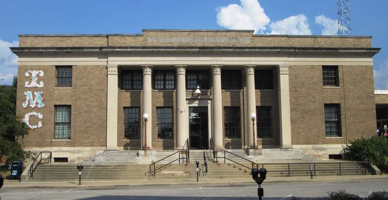 The U. S. Post Office, at 202 South Broadway Avenue in Urbana, Illinois, was built in 1914 and was designed by Oscar Wendroth in the Classical Revival style. The building was purchased by the Urbana Champaign Independent Media Center to be a