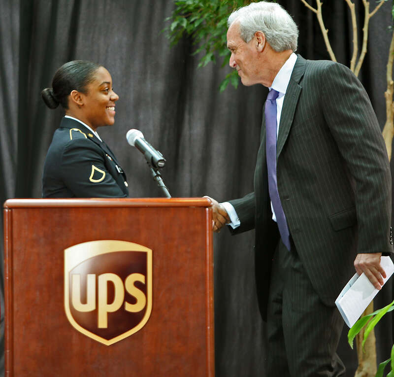 SANDY SPRINGS, Feb. 13, 2013  - Georgia Army Guard Pfc. Brittany Wynn, a wheel maintenance specialist with Marietta's 165th Quartermaster Company, and package sorter at the UPS Hub on Pleasantdale Road is thanked for her service by Scott Davis, UPS