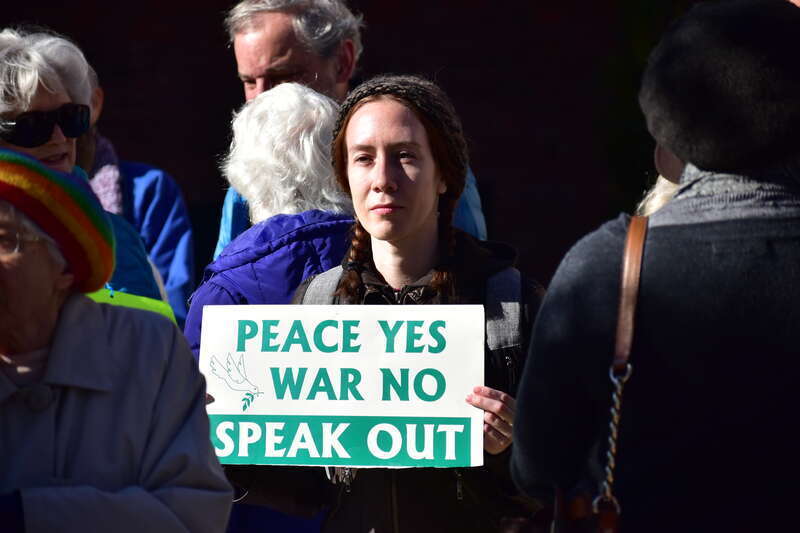 Over 50 people gather at Peace and Justice Plaza across the street from UNC-Chapel Hill to protest actions that might lead to a war with Iran.