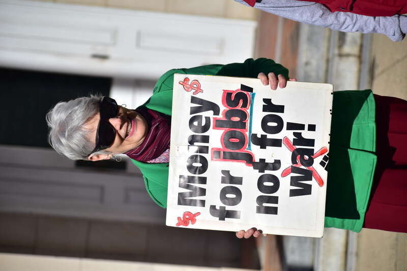 Over 50 people gather at Peace and Justice Plaza across the street from UNC-Chapel Hill to protest actions that might lead to a war with Iran.