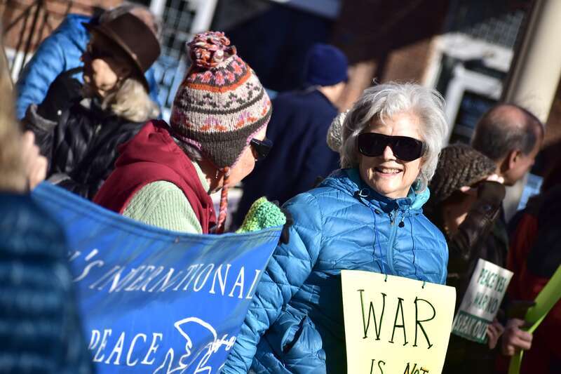 Over 50 people gather at Peace and Justice Plaza across the street from UNC-Chapel Hill to protest actions that might lead to a war with Iran.