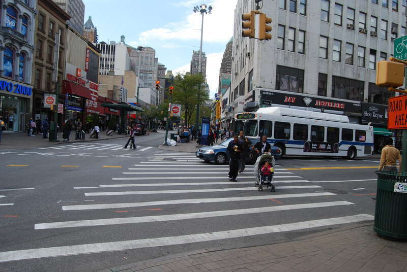 This photo is of Wikis Take Manhattan goal code R9, Children/Families, crossing street.