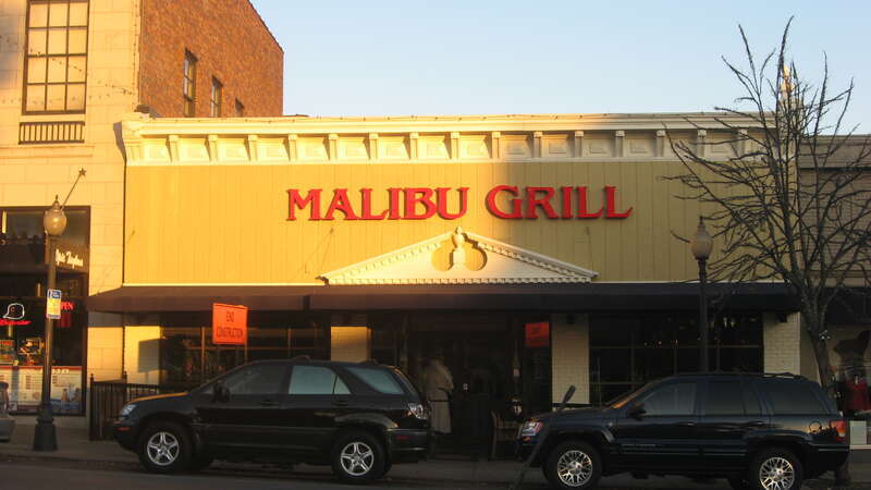 Front of the Malibu Grill, located at 106 N. Walnut Street in downtown Bloomington, Indiana, United States.  Built in 1895, it is part of the Courthouse Square Historic District, a historic district that is listed on the National Register of Historic