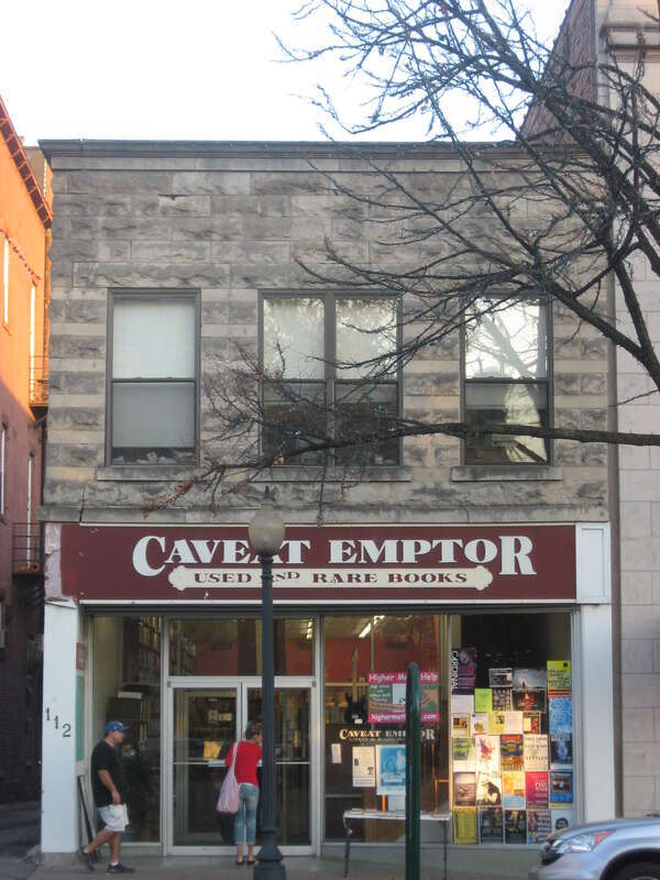 Front of Caveat Emptor, a rare books store located at 112 N. Walnut Street in downtown Bloomington, Indiana, United States.  Built in 1900, it is part of the Courthouse Square Historic District, a historic district that is listed on the National